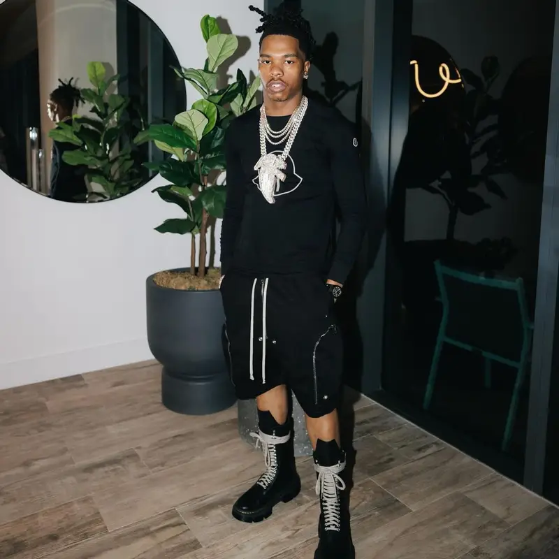 Lil Baby outfit in Moncler, Dr. Martens, and Rick Owens, 2024