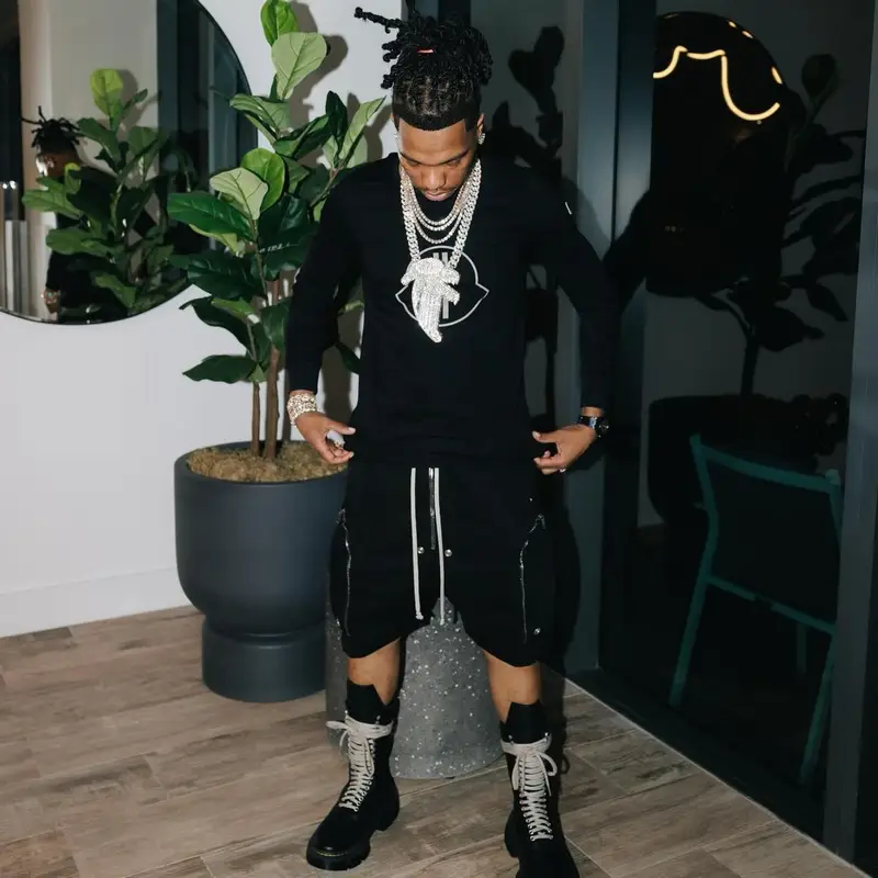 Lil Baby outfit in Moncler, Dr. Martens, and Rick Owens, 2024