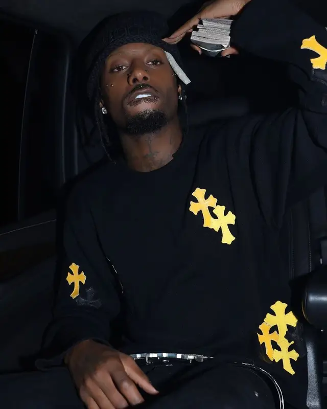 Playboi Carti outfit in Chrome Hearts, 2024