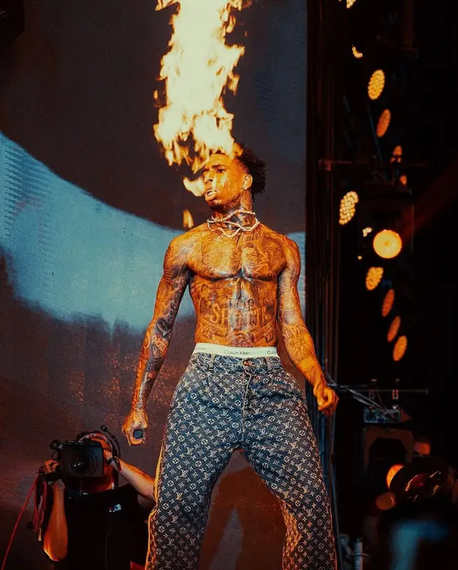 NLE Choppa outfit in Louis Vuitton and Calvin Klein, 2024