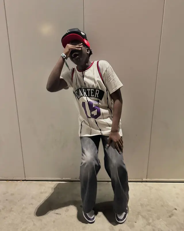 Dabo outfit in Mitchell & Ness, Levi’s, and Playboi Carti Merch, 2024