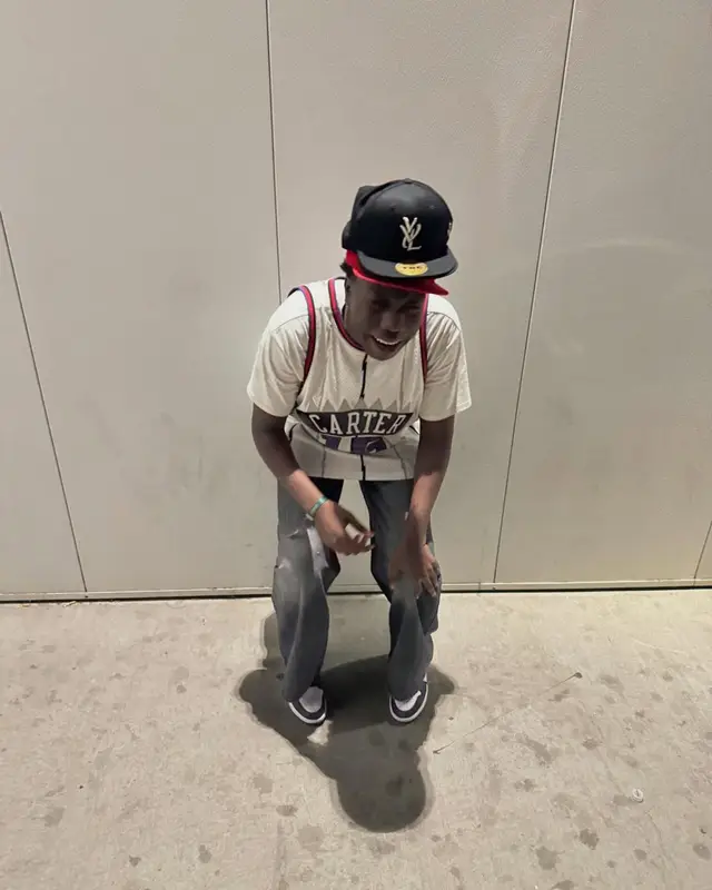 Dabo outfit in Mitchell & Ness, Levi’s, and Playboi Carti Merch, 2024
