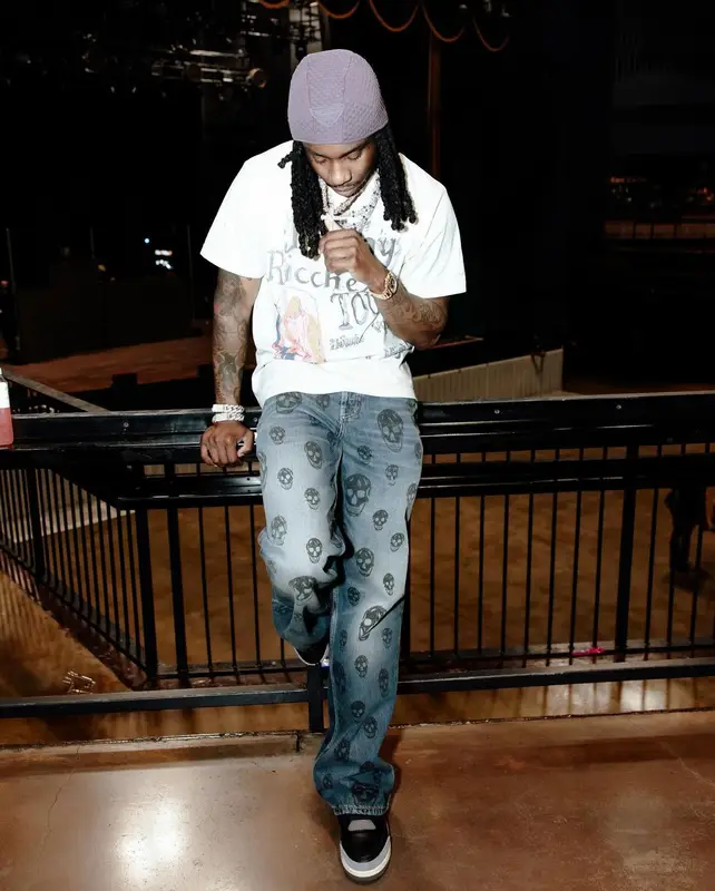 Polo G outfit in Alexander McQueen, Jordan, and Prada, 2024