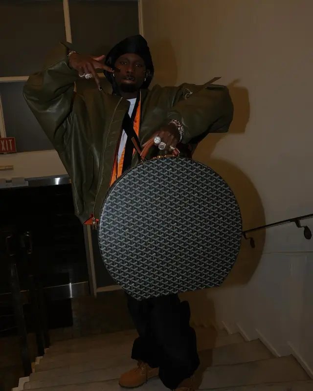 Playboi Carti outfit in Timberland and Goyard, 2024