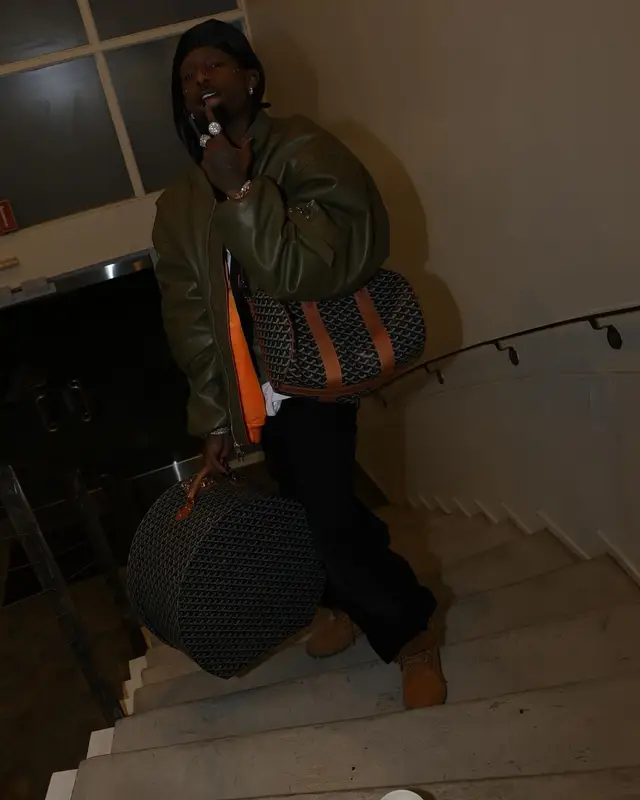 Playboi Carti outfit in Timberland and Goyard, 2024