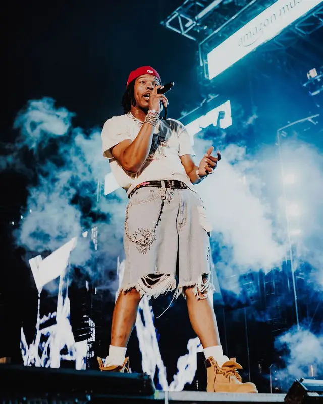 Lil Baby outfit in Louis Vuitton, Chrome Hearts, and New Era, 2024