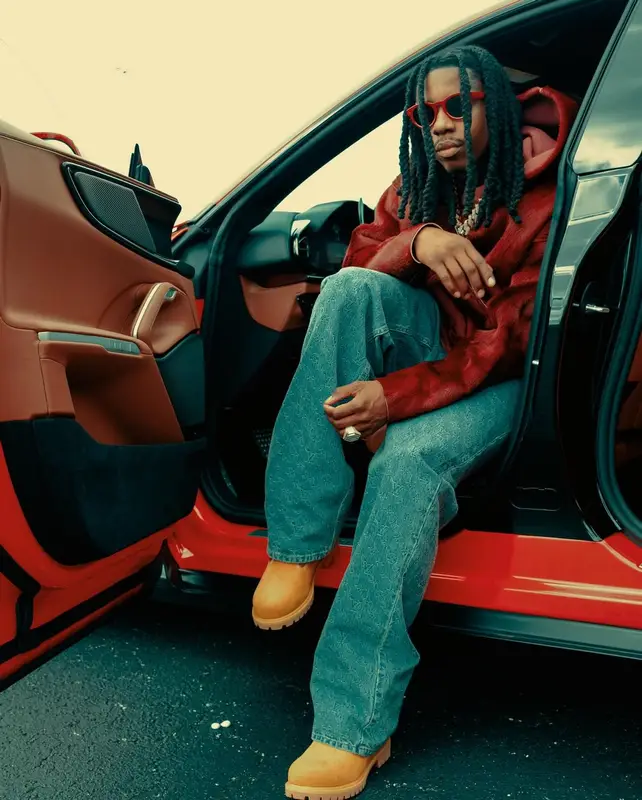 Polo G outfit in Timberland, Patek Philippe, and Louis Vuitton, 2025