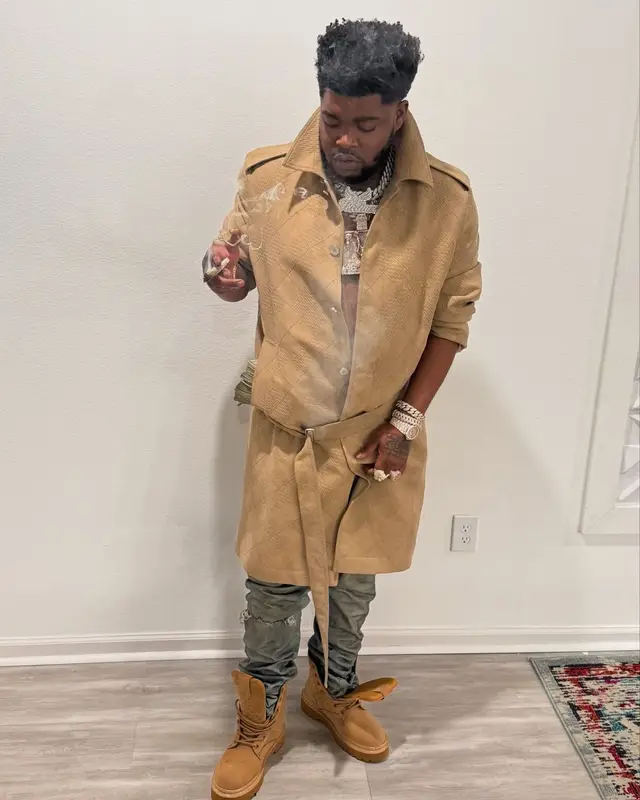 BossMan Dlow outfit in Louis Vuitton and Purple Brand, 2024