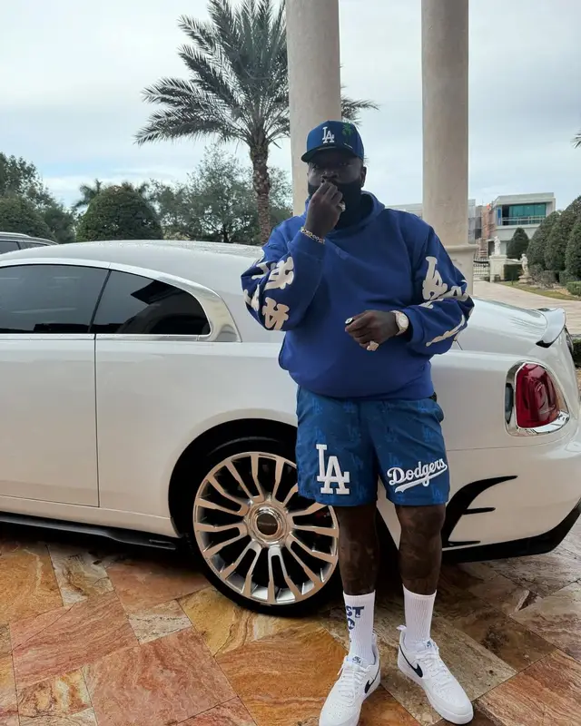Rick Ross outfit in Pro Standard, New Era, and Nike, 2025