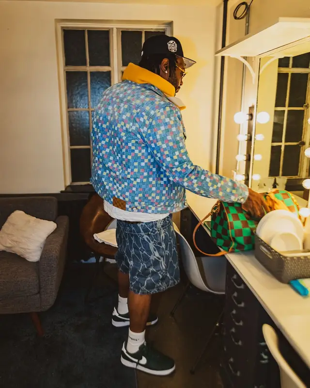 Peezy outfit in Nike, Louis Vuitton, and New Era, 2025