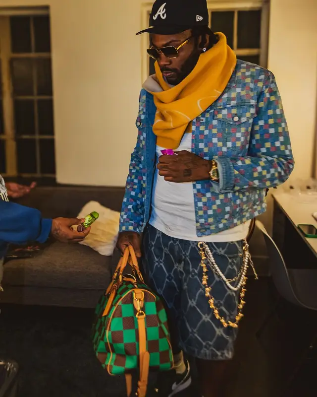 Peezy outfit in Nike, Louis Vuitton, and New Era, 2025