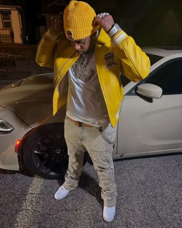 Finesse2tymes outfit in Nike, Louis Vuitton, and Avirex, 2025