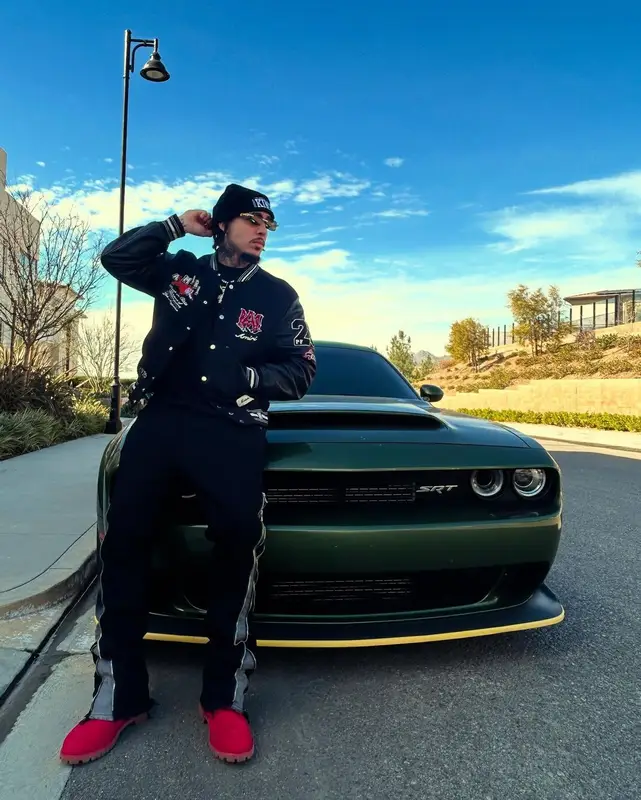 LiAngelo Ball outfit in Amiri, Cartier, and Mitchell & Ness, 2025