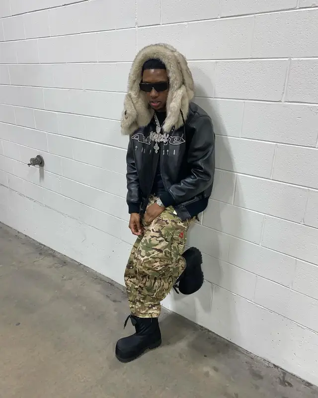 Rob49 outfit in Avirex, Rick Owens, and KidSuper, 2025