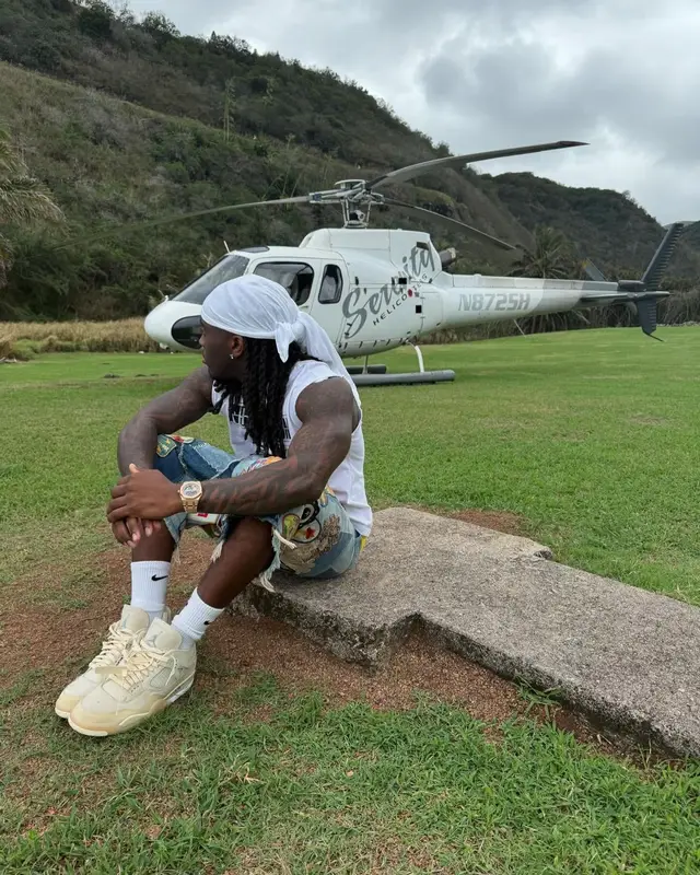 Kai Cenat outfit in Kapital, Jordan, and Nike, 2025
