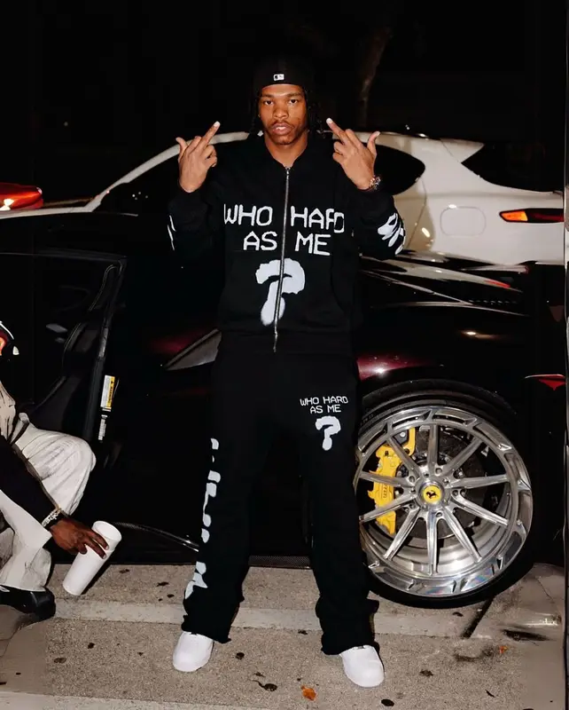 Lil Baby outfit in Lil Baby Merch, Nike, and New Era, 2025