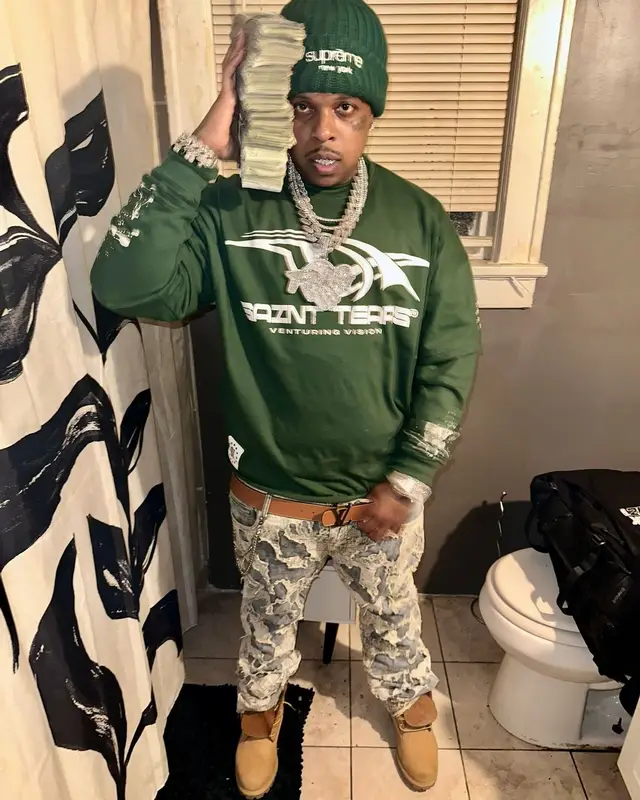 Finesse2tymes outfit in Timberland, Louis Vuitton, and Supreme, 2025