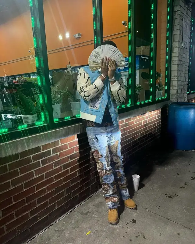 Baby Money outfit in Who Decides War, Louis Vuitton, and Timberland, 2025