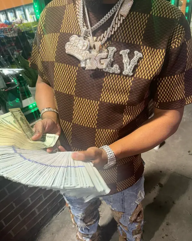 Baby Money outfit in Who Decides War, Louis Vuitton, and Timberland, 2025