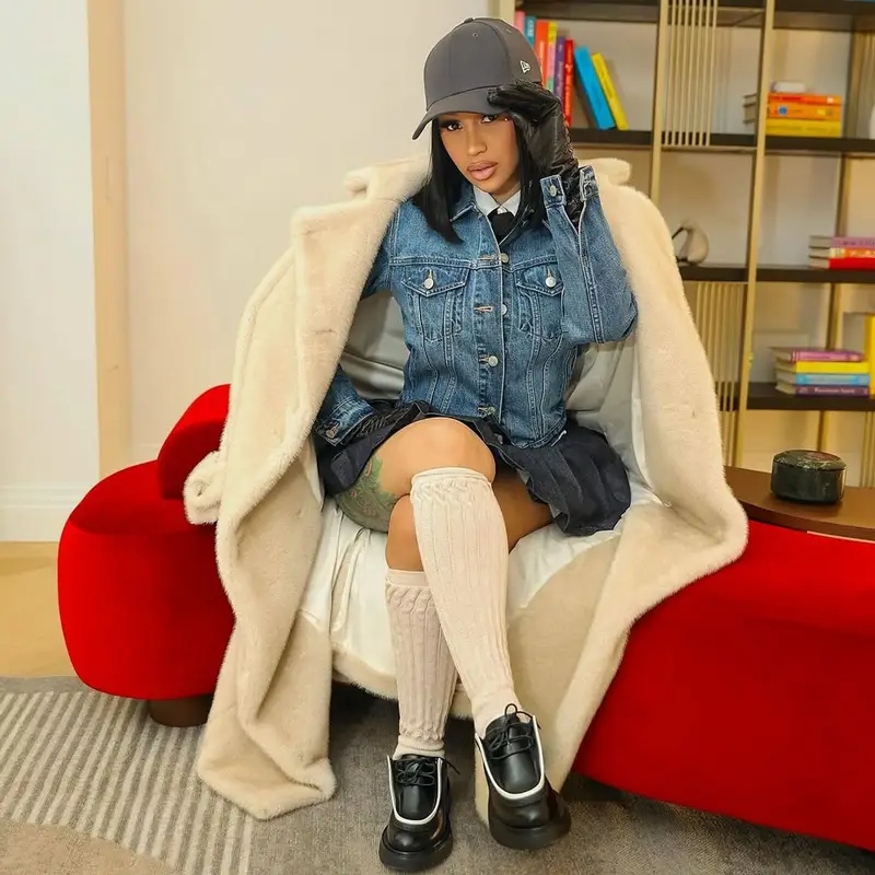 Cardi B outfit in Prada, New Era, and Bottega Veneta, 2025