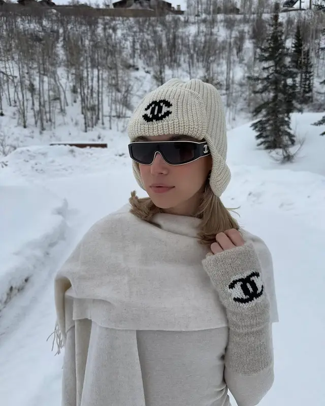 Sarah Snyder outfit in Moon Boot and Chanel, 2025