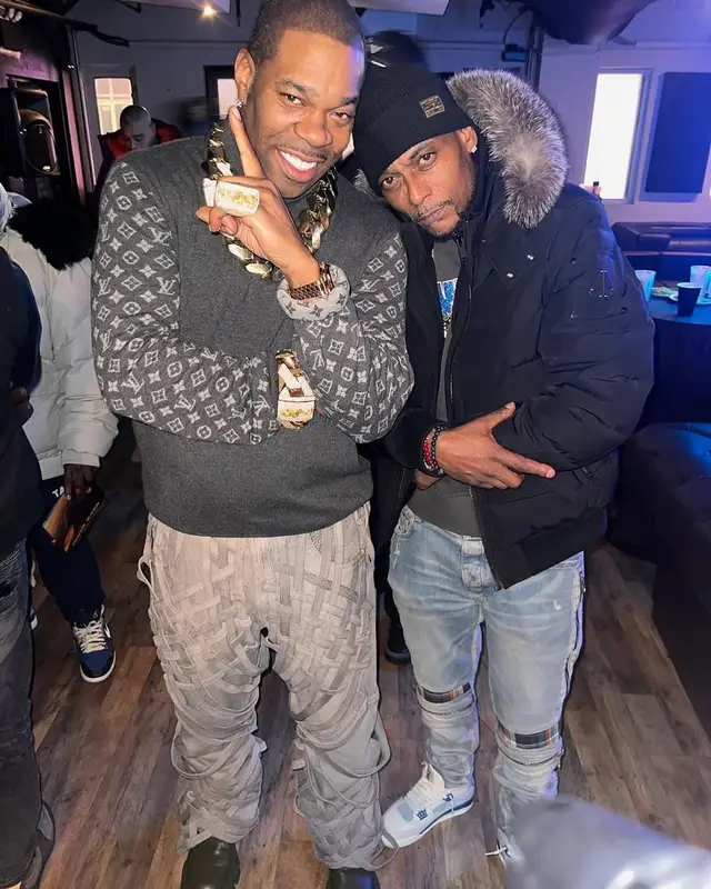 Busta Rhymes outfit in Who Decides War, Louis Vuitton, and Prada, 2025