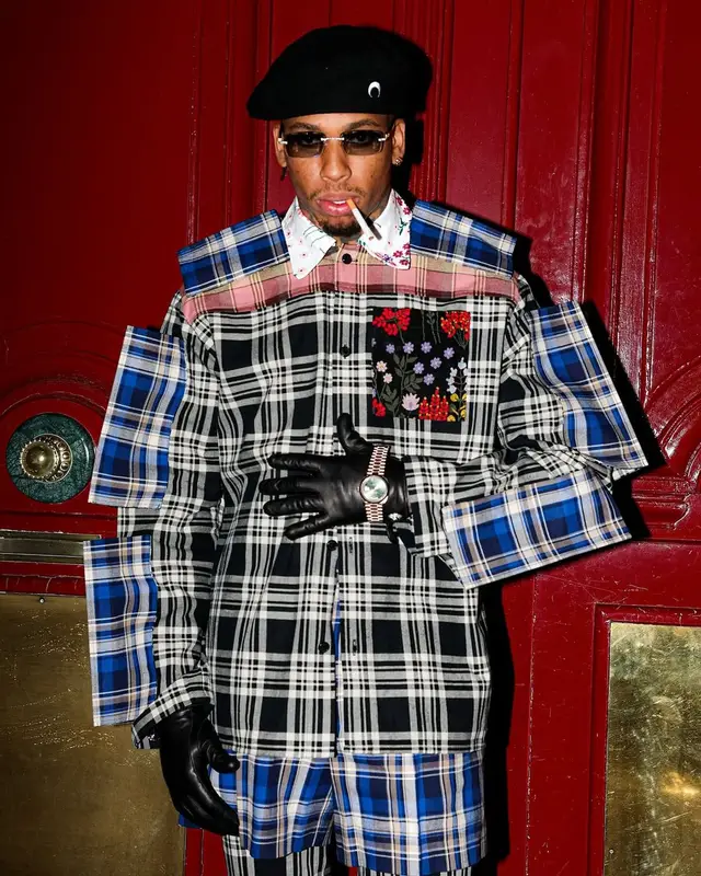 NLE Choppa outfit in Walter van Beirendonck, Rolex, and Marine Serre, 2025