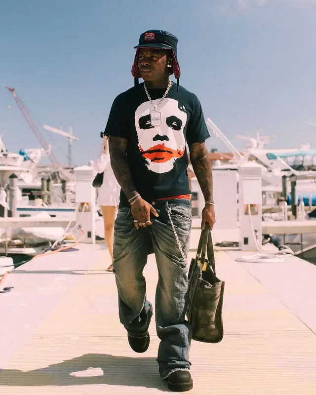 Asake outfit in Vintage, Balenciaga, and Chanel, 2025