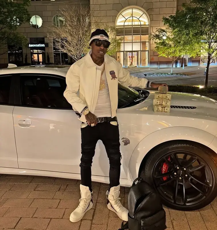 Zillionaire Doe outfit in Amiri, Valentino, and Avirex, 2025