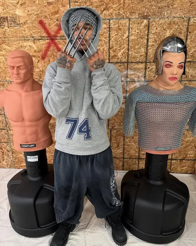 PlaqueBoyMax outfit in Travis Scott Merch and Balenciaga, 2025