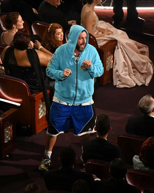 Adam Sandler outfit in Aviator Nation, Adidas, and Under Armour, 2025