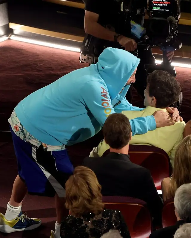 Adam Sandler outfit in Aviator Nation, Adidas, and Under Armour, 2025