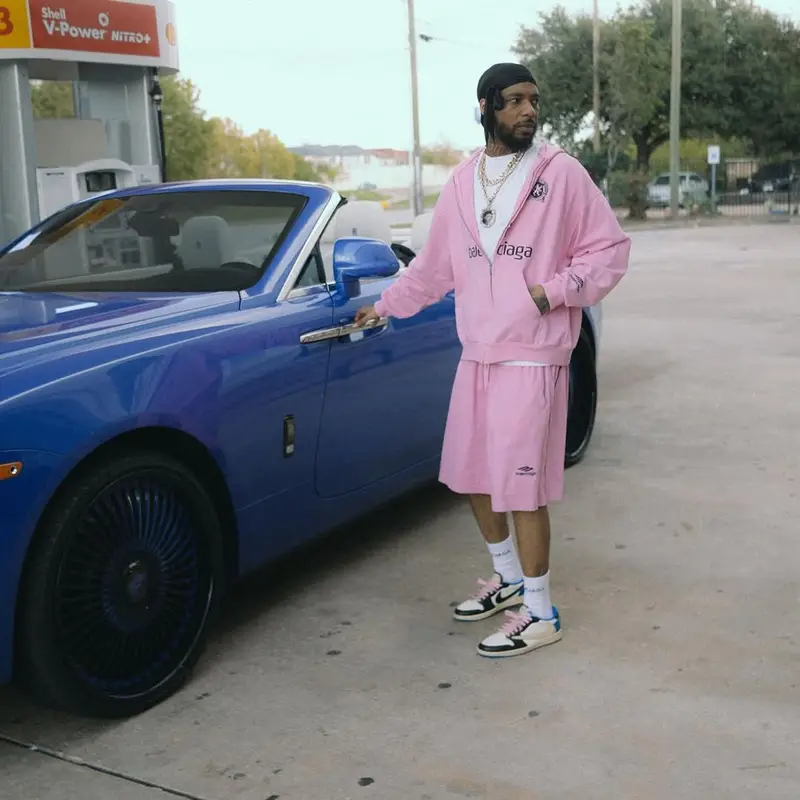 Key Glock outfit in Balenciaga, Nike, and Travis Scott Merch, 2025