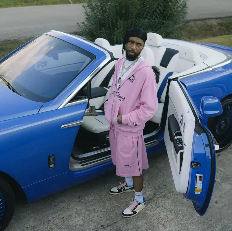 Key Glock outfit in Balenciaga, Nike, and Travis Scott Merch, 2025