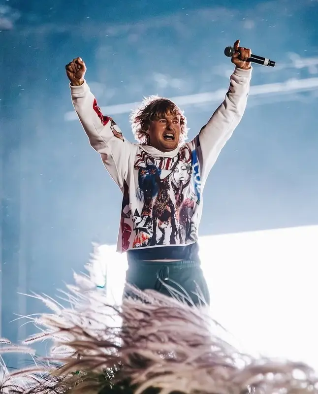 Owen Wilson outfit in Rolling Loud Merch, Nike, and Travis Scott Merch, 2024