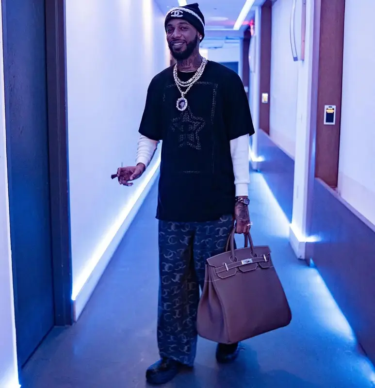 Key Glock outfit in Hermes, Chanel, and Bottega Veneta, 2025