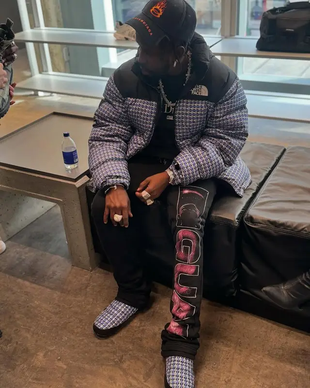 Popcaan outfit in Supreme, Balenciaga, and The North Face, 2025