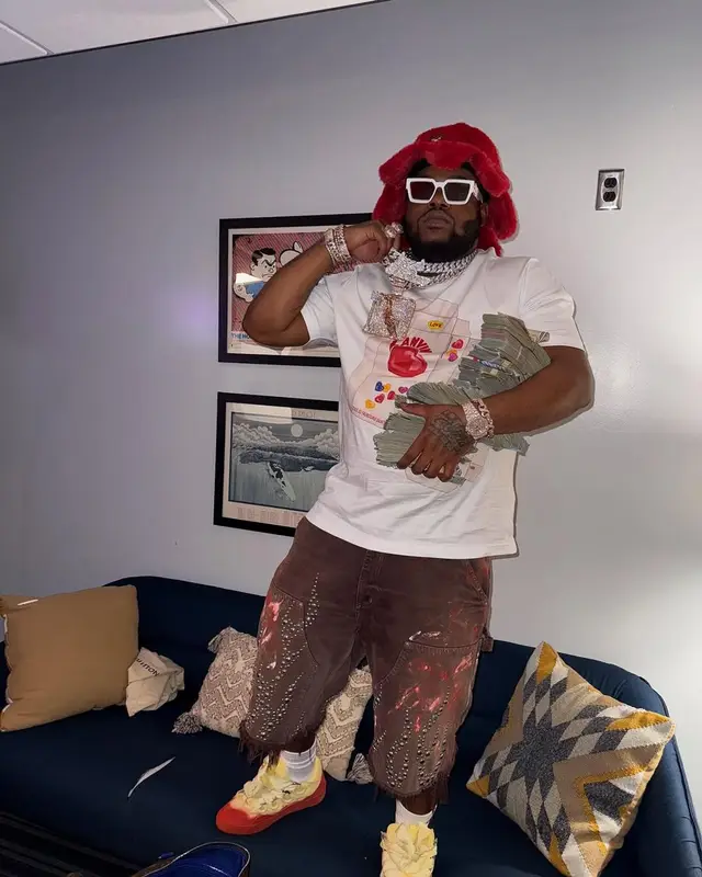 BossMan Dlow outfit in Lanvin, Louis Vuitton, and Glo Gang, 2025