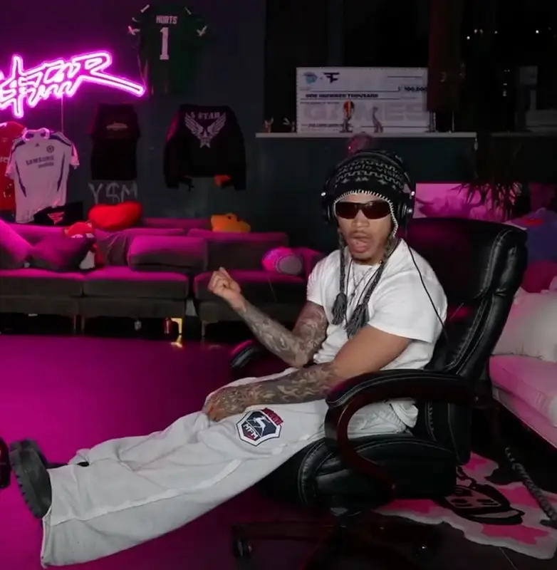 PlaqueBoyMax outfit in Hanes, Audio Technica, and Chrome Hearts, 2025