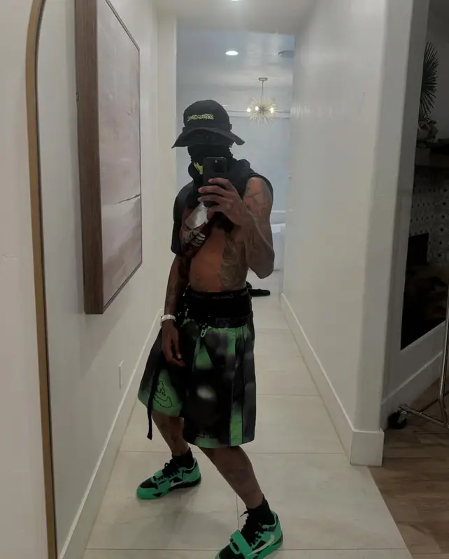 Travis Scott outfit in Nike, Travis Scott Merch, and Calvin Klein, 2025