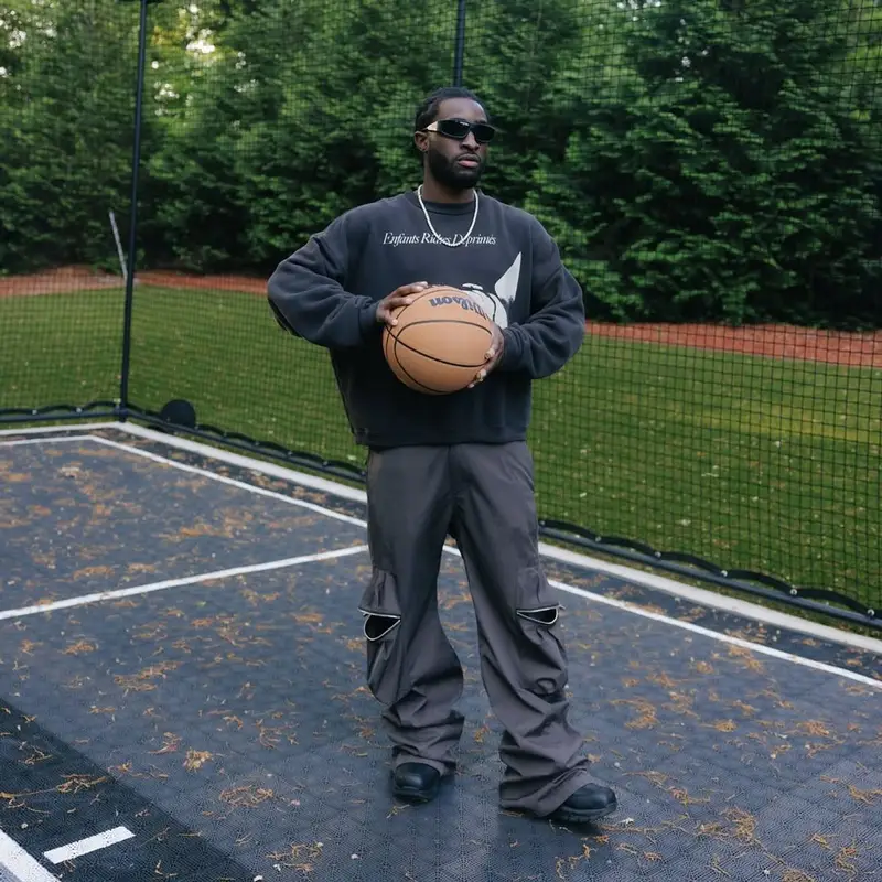 Lil Dann outfit in Enfants Riches Deprimes, Chrome Hearts, and Wilson, 2025