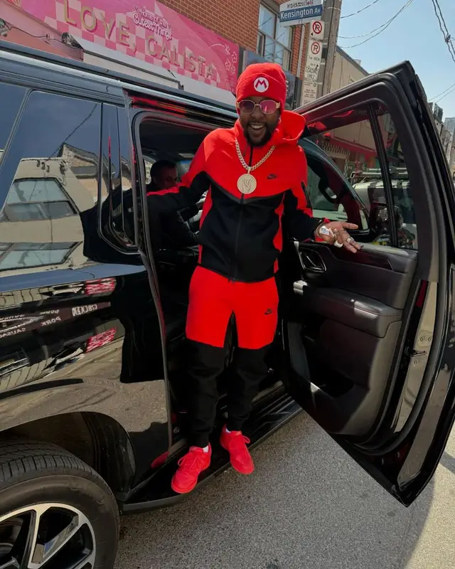 Popcaan outfit in Nike and Super Mario Merch, 2025