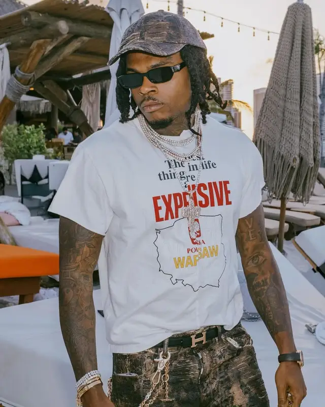 Gunna outfit in Patek Philippe, Prada, and Acne Studios, 2025