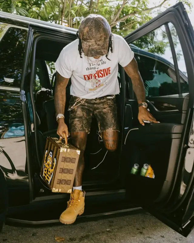 Gunna outfit in Patek Philippe, Prada, and Acne Studios, 2025