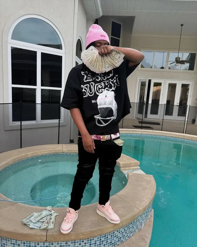 YN Jay outfit in Amiri, Louis Vuitton, and Supreme, 2025