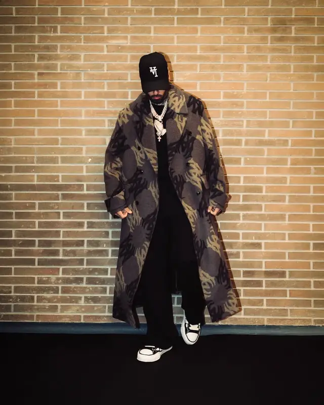 Nicky Jam outfit in Amiri, Maison Mihara Yasuhiro, and New Era, 2025