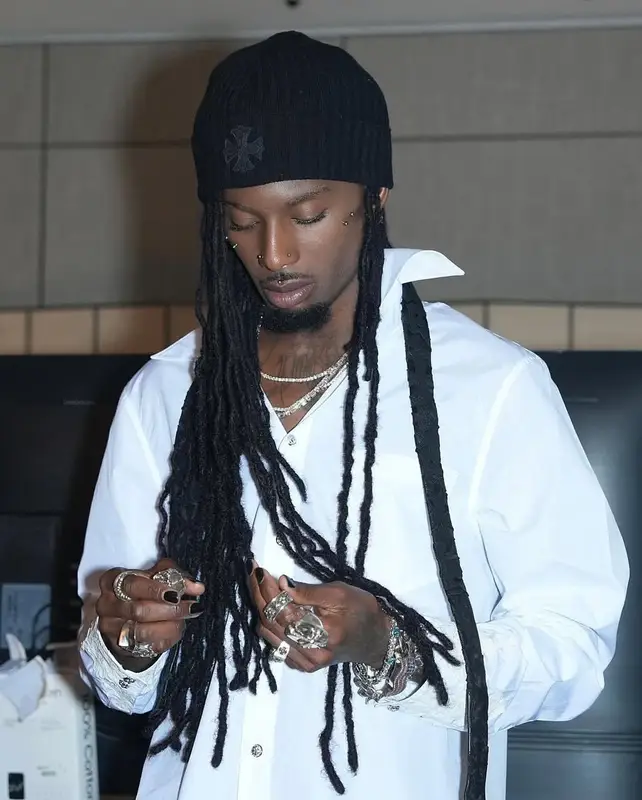 Playboi Carti outfit in Converse and Chrome Hearts, 2025