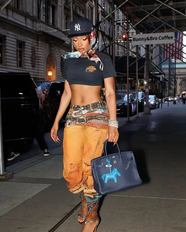 Megan Thee Stallion outfit in Vintage, New Era, and Harley-Davidson, 2025