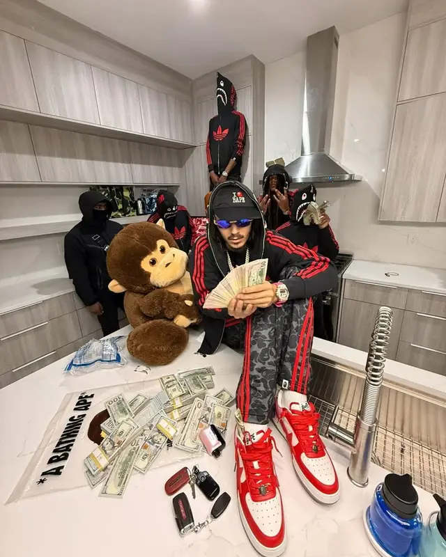 BabyTron outfit in Adidas, Cartier, and Bape, 2025