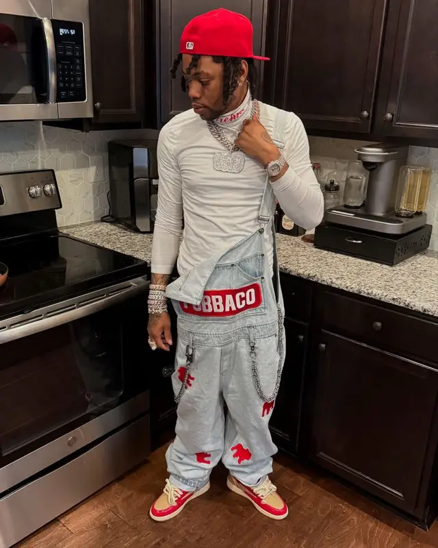 Lil Migo outfit in Pubbaco, Reves Paris, and New Era, 2025